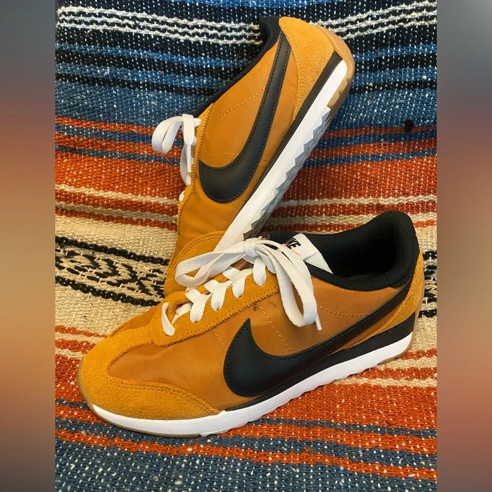 The Nike Pacific Sneaker in Monarch Orange and black swoosh. Only worn twice - Picture 3 of 4